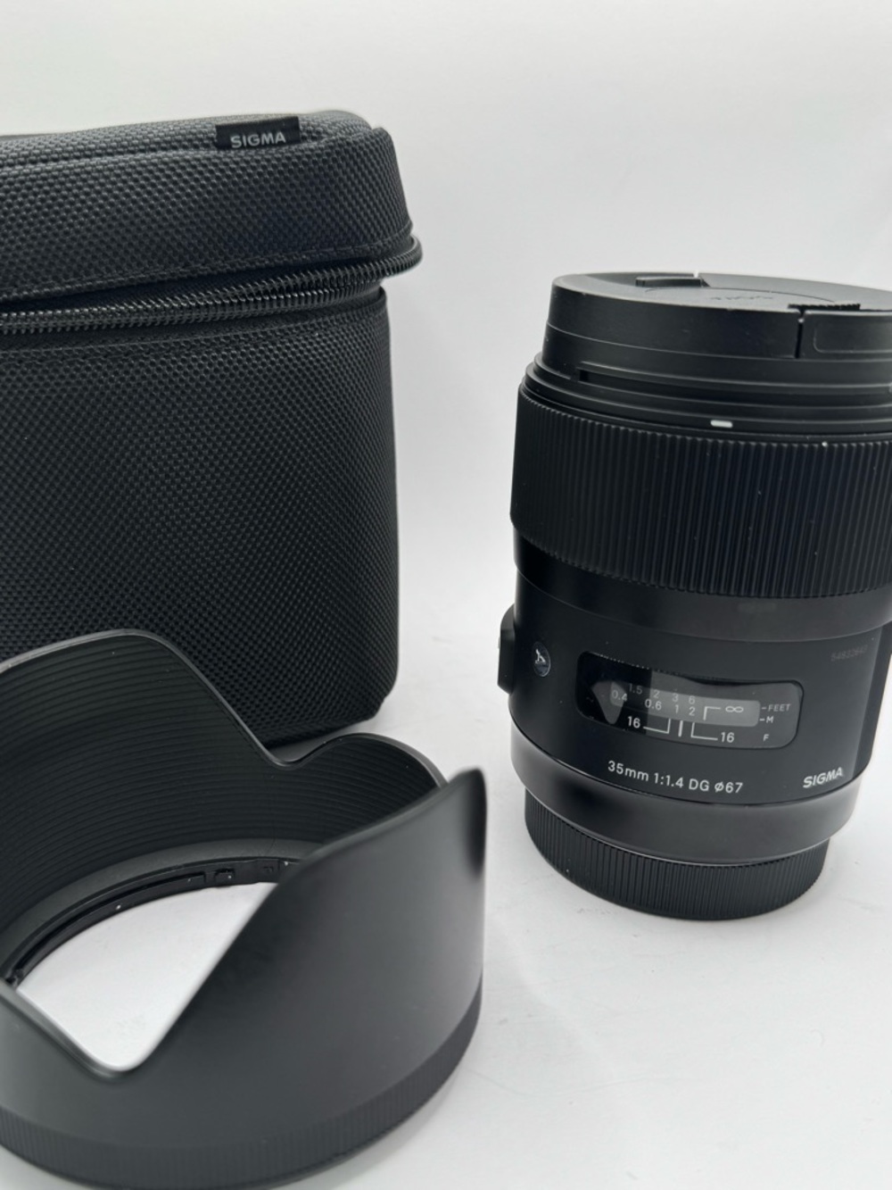 Sigma 35mm f/1.4 DG HSM Art Lens • Brand New • Includes Original Hood and Pouch